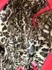 sac longchamp gatsby en cuir rouge embossé façon python