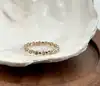 20014310 bague tour américain sertie de petits oxydes ronds t54