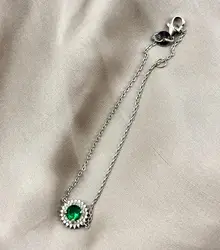 87398218 bracelet orné d'une pierre verte et entourée d'oxydes argent 925 millième (22 ct) 2,2g