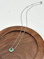 87398245 collier orné d'une pierre verte et entourée d'oxydes argent 925 millième (22 ct) 3g