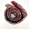 cravate hermès 100% soie rouge à motifs pommes, fleurs et feuillage
