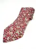 cravate hermès 100% soie rouge à motifs pommes, fleurs et feuillage