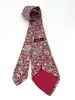 cravate hermès 100% soie rouge à motifs pommes, fleurs et feuillage