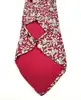 cravate hermès 100% soie rouge à motifs pommes, fleurs et feuillage