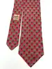 cravate hermès vintage en soie rouge à motif arbres