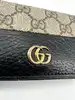 portefeuille gucci bicolore gg marmont en cuir noir et toile beige