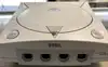 console sega dreamcast avec une manette