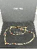 sautoir/ collier chanel doré avec détails couleur bordeaux
