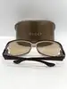 lunettes de soleil gucci gg 2995/s ornées du logo gucci avec des verres marron clair