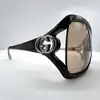 lunettes de soleil gucci gg 2995/s ornées du logo gucci avec des verres marron clair