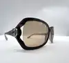lunettes de soleil gucci gg 2995/s ornées du logo gucci avec des verres marron clair