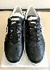 baskets / chaussures tennis chanel en cuir noir avec logo modèle uniform t42