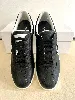 baskets / chaussures tennis chanel en cuir noir avec logo modèle uniform t42