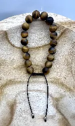 brpi bracelet cordon noir reglable avec pierre oeil de tigre mate d10 mm