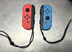 paire de joycon officiel nintendo bleu et rouge