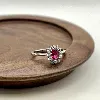 1930320 bague marguerite centrée d'une pierre rouge entourée d'oxydes t52 argent 925 millième (22 ct) 2,13g argent 925 millième (2