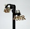 boucles d'oreilles dior tribales perles et cristaux multicolores, motif dior