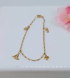 bracelet maille cheval orné de 4 charms pendants or 750 millième (18 ct) 2,54g