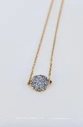 bracelet orné d'un pendentif rond en 2 ors motifs brillantés or 375 millième (9 ct) 0,67g