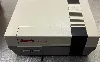 console nintendo entertainment system nes avec une manette