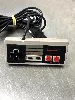 console nintendo entertainment system nes avec une manette