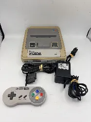 console nintendo super nes snes avec une manette