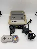 console nintendo super nes snes avec une manette