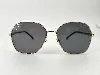 lunettes chanel polarized avec monture couleur doré clair et verres gris