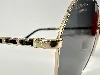 lunettes chanel polarized avec monture couleur doré clair et verres gris