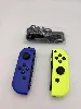 paire de joycon nintendo bleu et jaune fluo