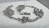 bracelet kenzo motifs fleurs argent 925 millième (22 ct) 13,55g