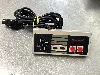 console nintendo entertainment system nes avec une manette