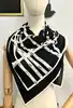 foulard hermès bolduc en jersey de soie blanc et noir avec une certaine élasticité version 2009