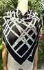 foulard hermès bolduc en jersey de soie blanc et noir avec une certaine élasticité version 2009