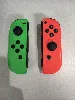 paire de joycon officiel nintendo vert et rouge