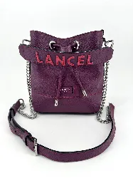 sac seau lancel ninon en cuir grainé violet surpiqûre rouge