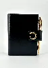 agenda cartier en cuir noir avec porte mine trinity