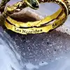 bague les néréides en forme de serpent et fleurs avec pierres orange et rouge
