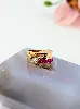 bague tank sertie un diamants d'environ 0,10ct et une ligne de ornée de rubis synthétiques taille baguettes or 750 millième (18 ct