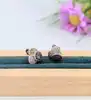 boucles d'oreilles en or blanc avec des pavages de diamants blancs, noires et citrine or 750 millième (18 ct) 5,47g