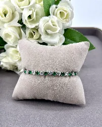 bracelet rivière serti d'oxydes verts et incolores