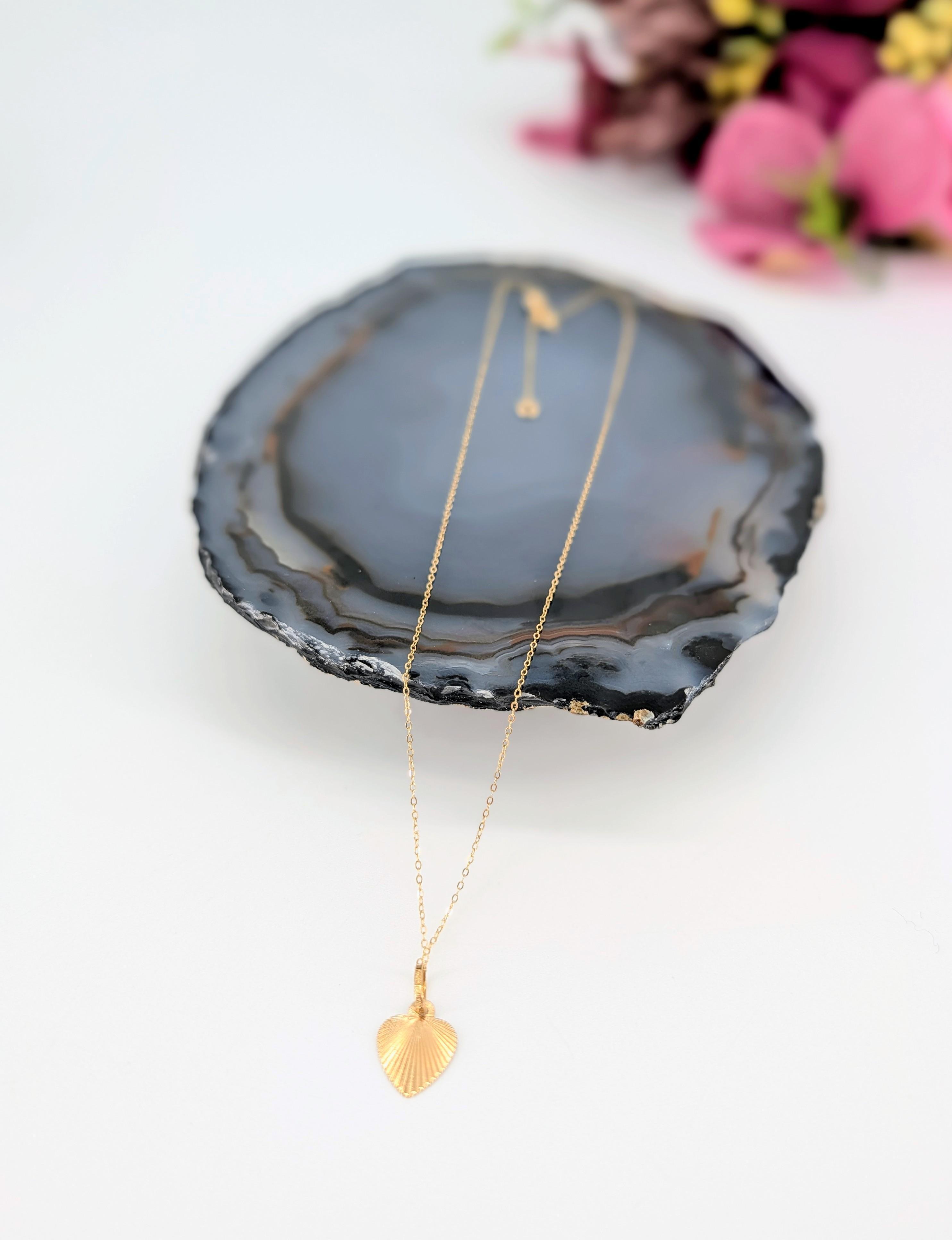 Collier fin maille forçat rond orné d'un pendentif coeur limé en or Or 750 Millième (18 CT) 1,15g