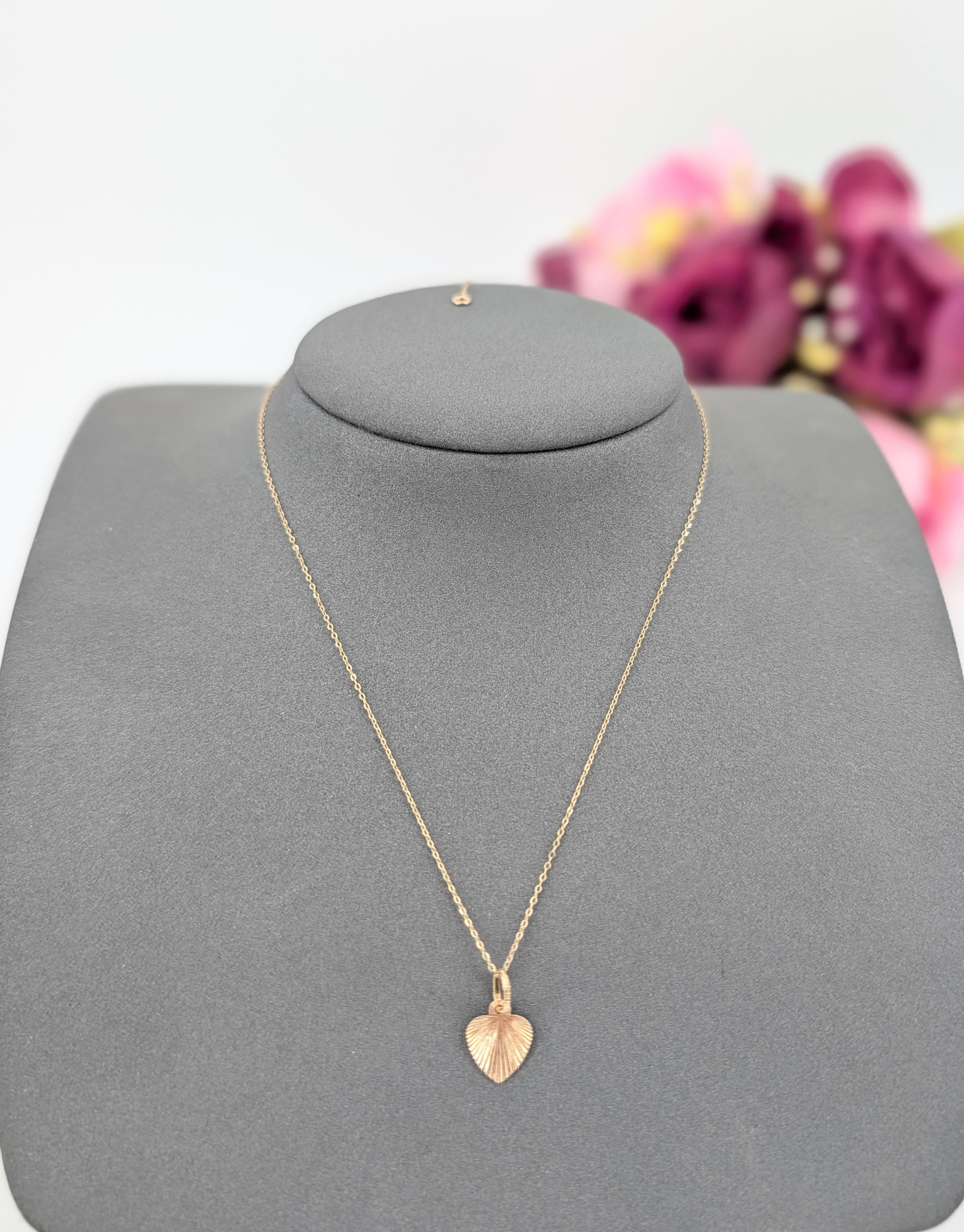 Collier fin maille forçat rond orné d'un pendentif coeur limé en or Or 750 Millième (18 CT) 1,15g