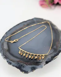 collier maille vénitienne orné d'un motif avec des billes en or et en pierre jaune or 750 millième (18 ct) 4,65g