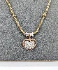 collier orné d'un pendentif coeur en 2 ors pavé de petits diamants d'environ 0,69ct au total or 750 millième (18 ct) 10,85g