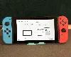 console nintendo switch rouge fluorescent/ bleu neon