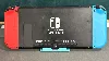 console nintendo switch rouge fluorescent/ bleu neon