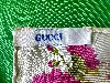 foulard / carré gucci motif fleurs en soie dans des tons dominants vert et bleu