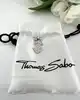 pendentif charm thomas sabo dollar serti d'oxydes de zirconium blancs argent 925 millième (22 ct) 1,83g
