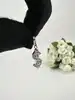 pendentif charm thomas sabo dollar serti d'oxydes de zirconium blancs argent 925 millième (22 ct) 1,83g